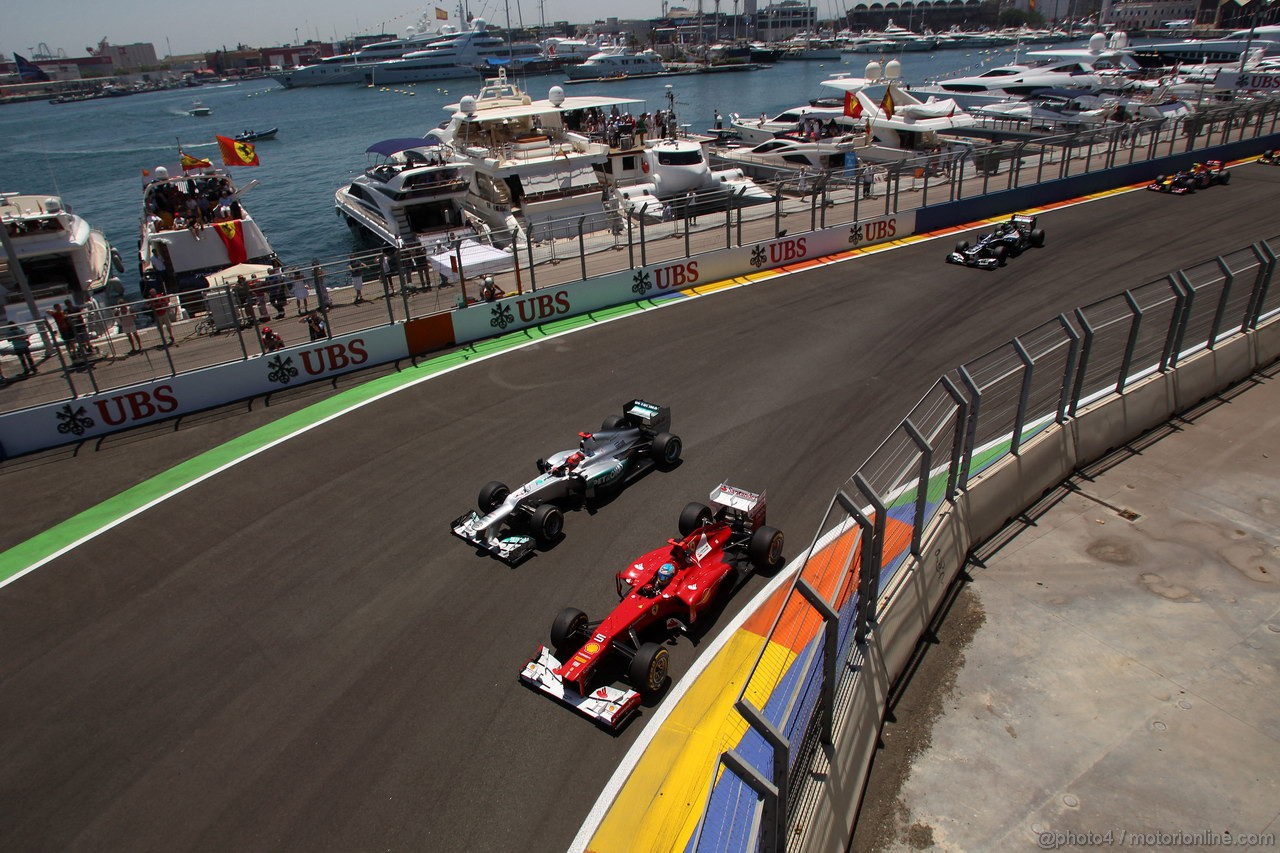 GP EUROPA, 24.06.2012- Gara, Fernando Alonso (ESP) Ferrari F2012 e Michael Schumacher (GER) Mercedes AMG F1 W03 