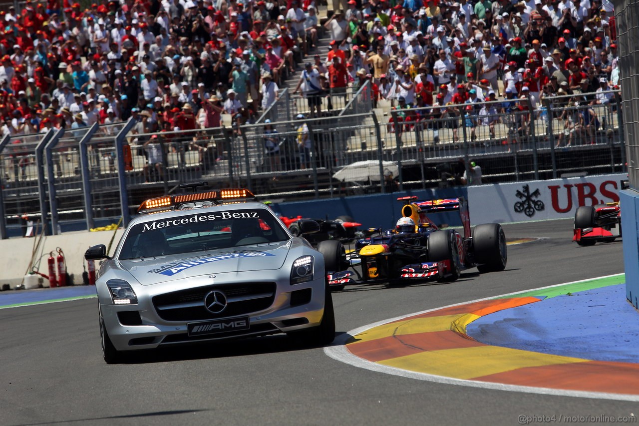 GP EUROPA, 24.06.2012- Gara, Safety car davanti a Sebastian Vettel (GER) Red Bull Racing RB8 