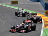 GP EUROPA, 24.06.2012- Gara, Lewis Hamilton (GBR) McLaren Mercedes MP4-27 davanti a Romain Grosjean (FRA) Lotus F1 Team E20 