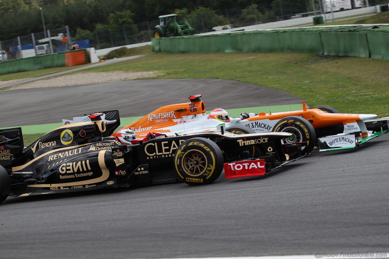GP GERMANIA, 22.07.2012 - Gara, Kimi Raikkonen (FIN) Lotus F1 Team E20 overtaking Paul di Resta (GBR) Sahara Force India F1 Team VJM05