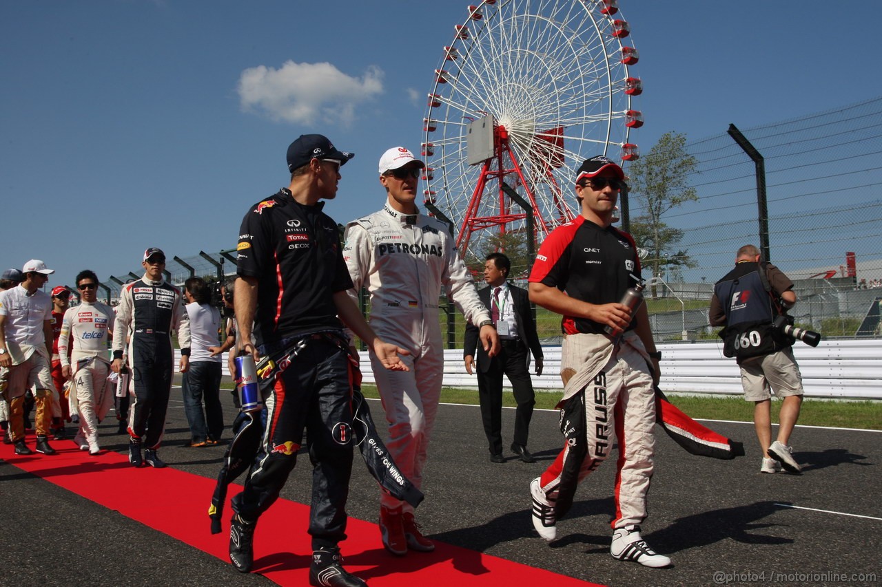 GP GIAPPONE, 07.10.2012- Sebastian Vettel (GER) Red Bull Racing RB8, Michael Schumacher (GER) Mercedes AMG F1 W03 e Timo Glock (GER) Marussia F1 Team MR01 at drivers parade  