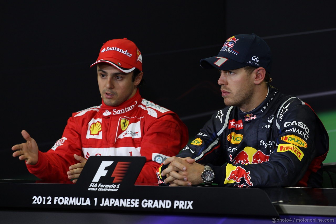 GP GIAPPONE, 07.10.2012- Gara, (L-R) Felipe Massa (BRA) Ferrari F2012 e Sebastian Vettel (GER) Red Bull Racing RB8 