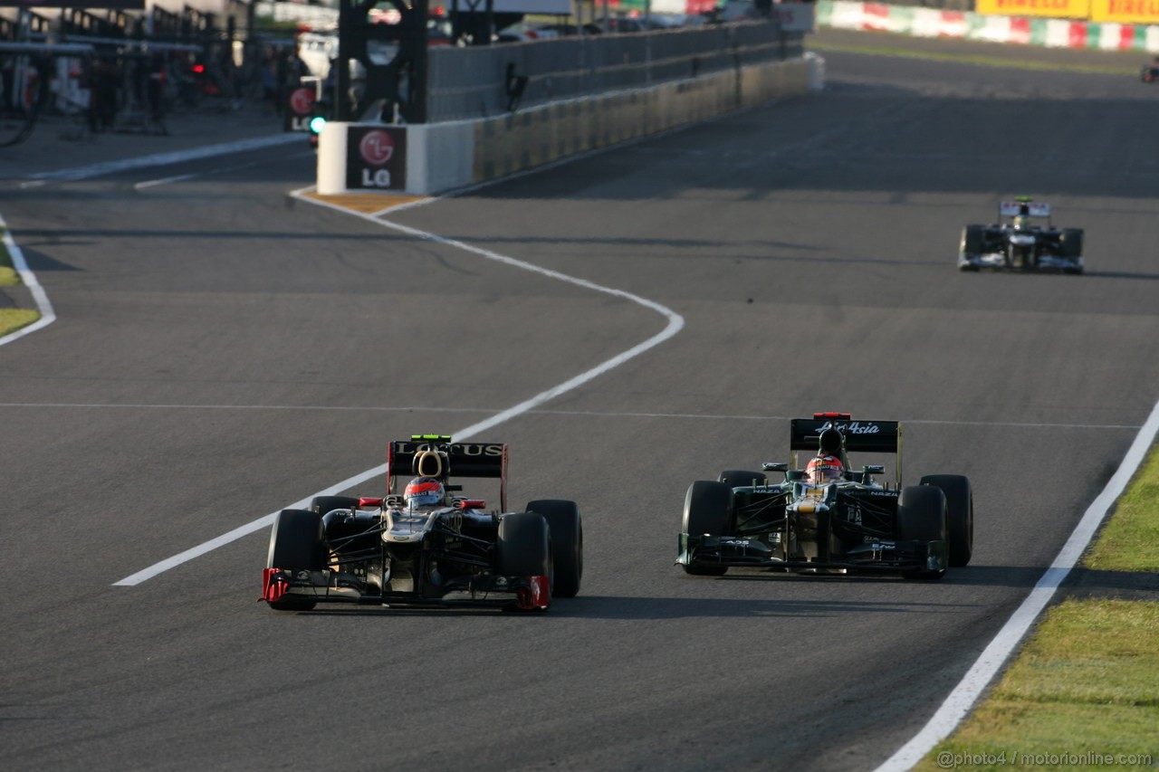 GP GIAPPONE, 07.10.2012- Gara, Romain Grosjean (FRA) Lotus F1 Team E20 e Heikki Kovalainen (FIN) Caterham F1 Team CT01 