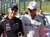 GP GIAPPONE, 07.10.2012- Sebastian Vettel (GER) Red Bull Racing RB8 e Michael Schumacher (GER) Mercedes AMG F1 W03