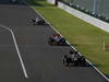 GP GIAPPONE, 07.10.2012- Gara, Kimi Raikkonen (FIN) Lotus F1 Team E20 davanti a Lewis Hamilton (GBR) McLaren Mercedes MP4-27 