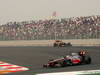 GP INDIA, 28.10.2012- Gara, Jenson Button (GBR) McLaren Mercedes MP4-27 e Kimi Raikkonen (FIN) Lotus F1 Team E20 