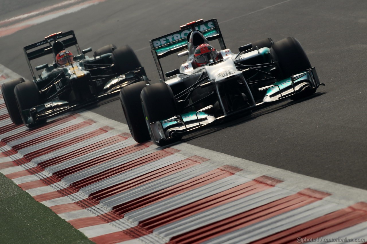 GP INDIA, 27.10.2012- Prove Libere 3, Michael Schumacher (GER) Mercedes AMG F1 W03 davanti a Heikki Kovalainen (FIN) Caterham F1 Team CT01 