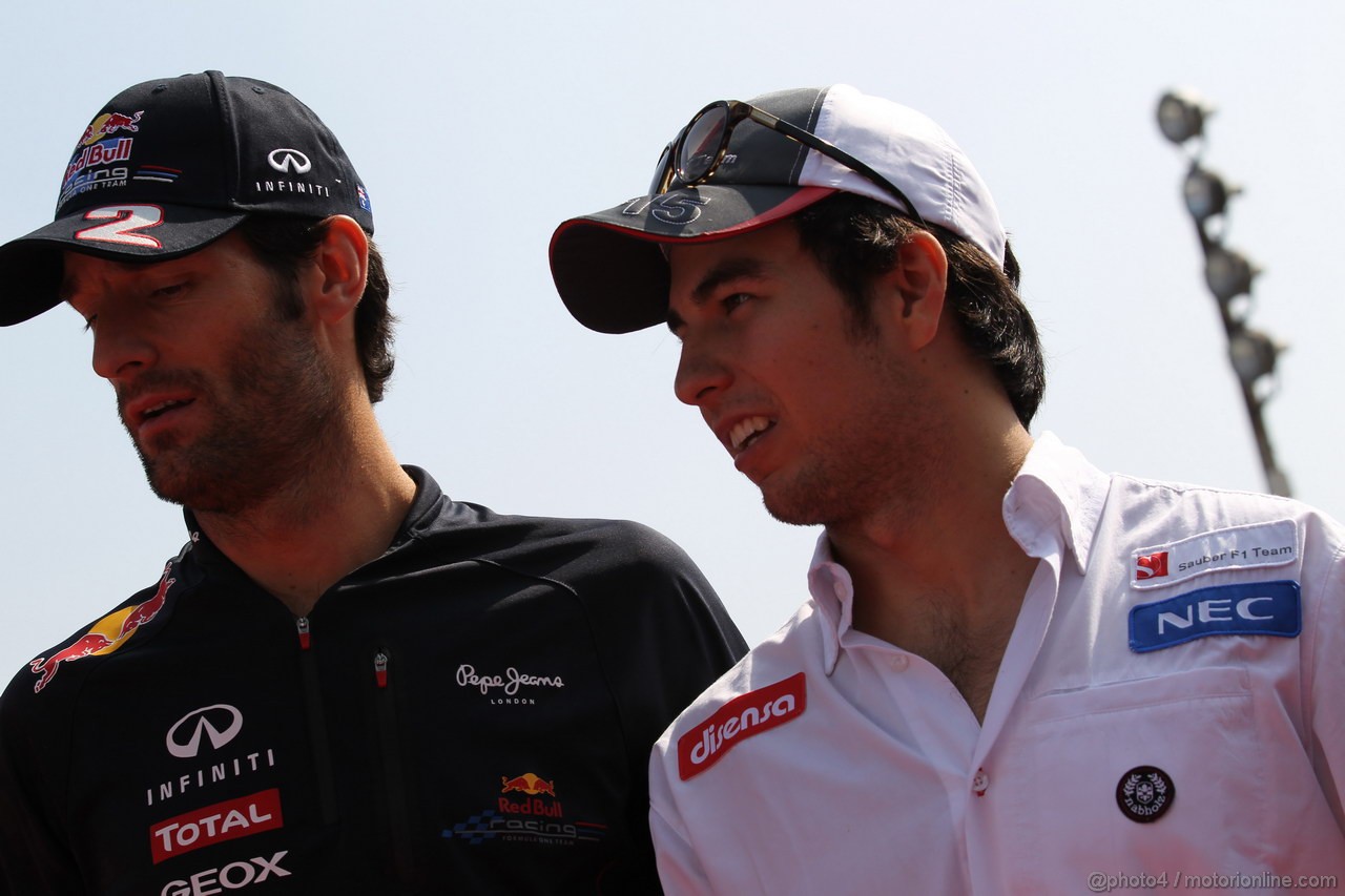 GP ITALIA, 09.09.2012- Mark Webber (AUS) Red Bull Racing RB8 e Sergio Prez (MEX) Sauber F1 Team C31 