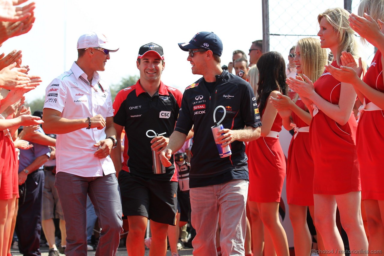 GP ITALIA, 09.09.2012- Michael Schumacher (GER) Mercedes AMG F1 W03, Timo Glock (GER) Marussia F1 Team MR01 e Sebastian Vettel (GER) Red Bull Racing RB8