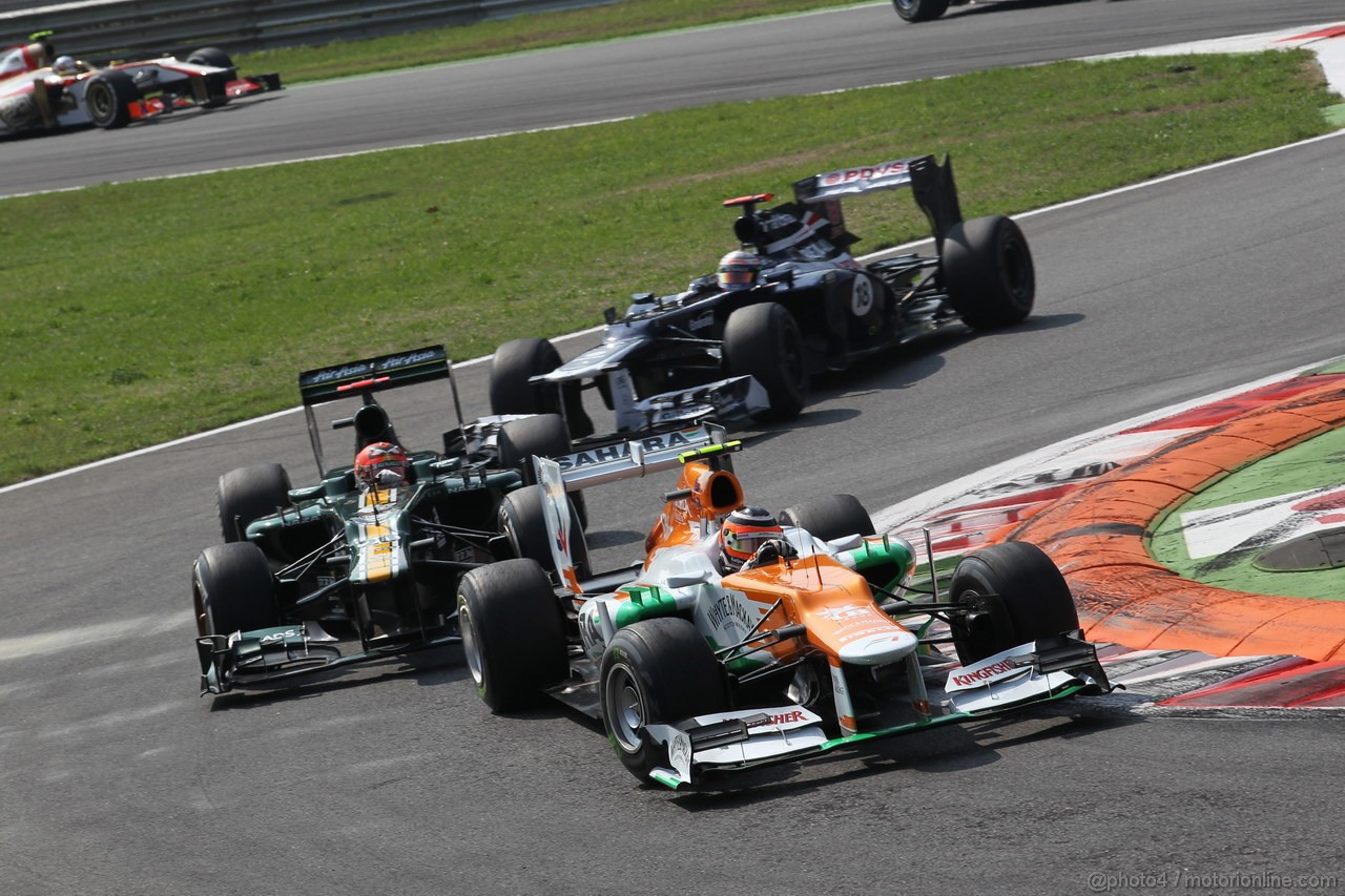 GP ITALIA, 09.09.2012- Gara,  Nico Hulkenberg (GER) Sahara Force India F1 Team VJM05 davanti a Heikki Kovalainen (FIN) Caterham F1 Team CT01 