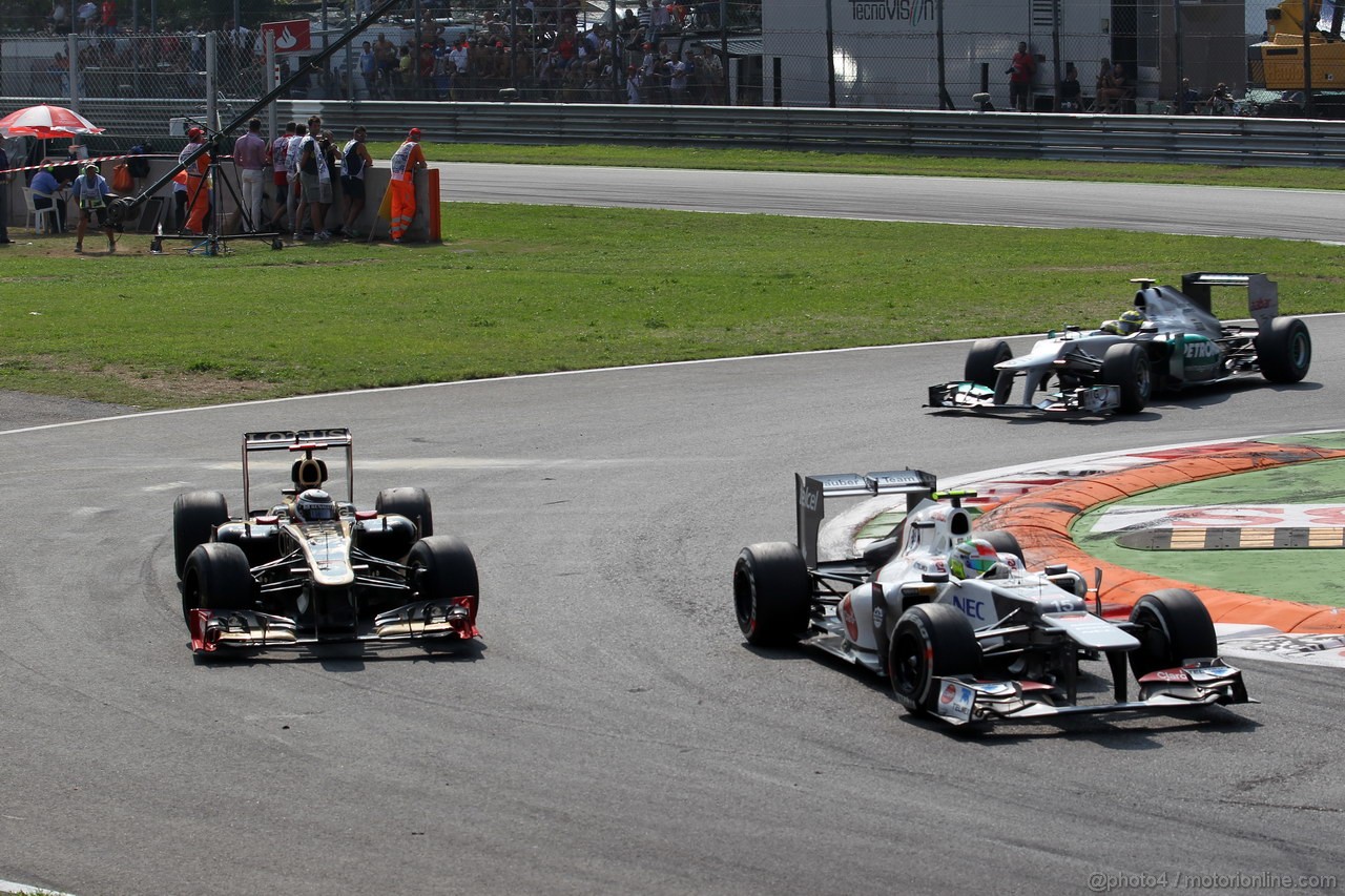 GP ITALIA, 09.09.2012- Gara,  Kimi Raikkonen (FIN) Lotus F1 Team E20 e Sergio Prez (MEX) Sauber F1 Team C31 