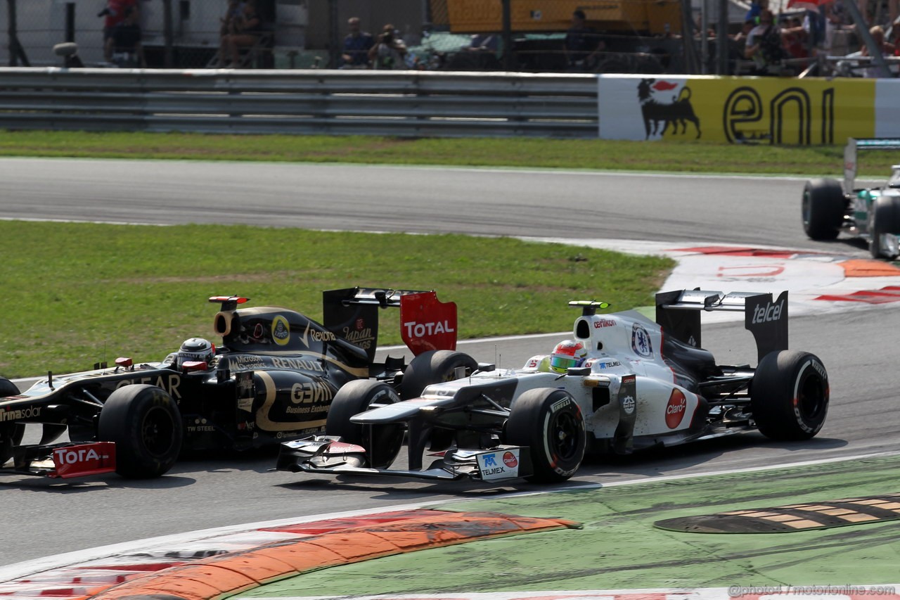 GP ITALIA, 09.09.2012- Gara,  Kimi Raikkonen (FIN) Lotus F1 Team E20 e Sergio Prez (MEX) Sauber F1 Team C31 