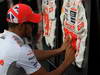 GP ITALIA, 07.09.2012- Lewis Hamilton (GBR) McLaren Mercedes MP4-27 signs his race overall for Emilia eathquake victims