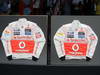 GP ITALIA, 07.09.2012- Jenson Button (GBR) McLaren Mercedes MP4-27 e Lewis Hamilton (GBR) McLaren Mercedes MP4-27 sign their race overalls for Emilia eathquake victims