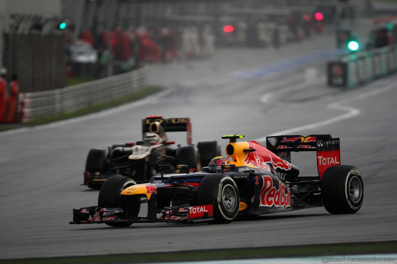 GP MALESIA, 25.03.2012- Gara, Mark Webber (AUS) Red Bull Racing RB8 e Kimi Raikkonen (FIN) Lotus F1 Team E20 