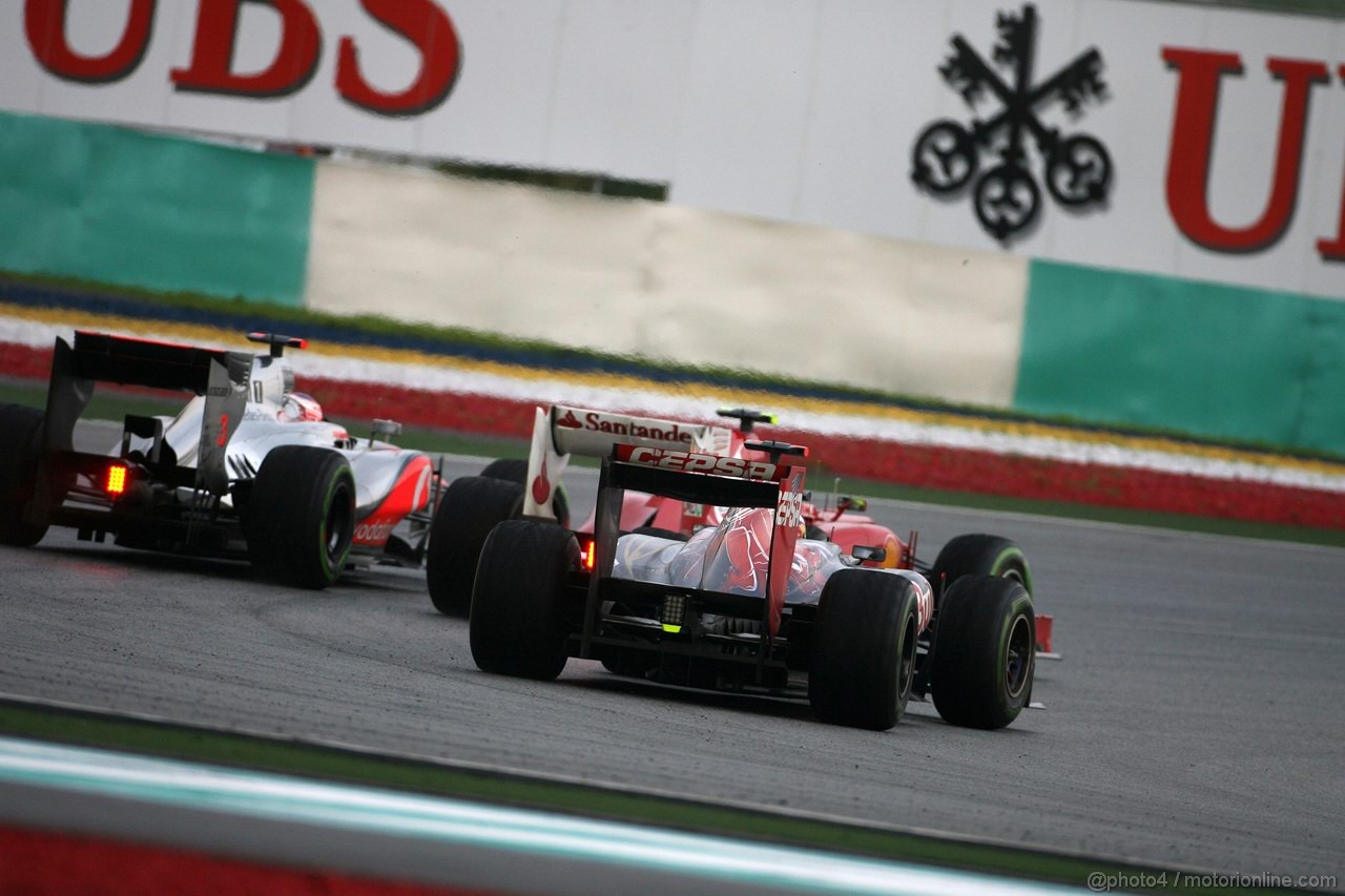 GP MALESIA, 25.03.2012- Gara, Jenson Button (GBR) McLaren Mercedes MP4-27, Felipe Massa (BRA) Ferrari F2012 e Daniel Ricciardo (AUS) Scuderia Toro Rosso STR7 