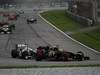 GP MALESIA, 25.03.2012- Gara, Kimi Raikkonen (FIN) Lotus F1 Team E20 davanti a Kamui Kobayashi (JAP) Sauber F1 Team C31 