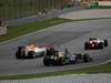 GP MALESIA, 25.03.2012- Gara, Heikki Kovalainen (FIN) Caterham F1 Team CT01 e Nico Hulkenberg (GER) Sahara Force India F1 Team VJM05 