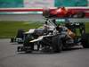 GP MALESIA, 25.03.2012- Gara, Nico Rosberg (GER) Mercedes AMG F1 W03 e Vitaly Petrov (RUS) Caterham F1 Team CT01 