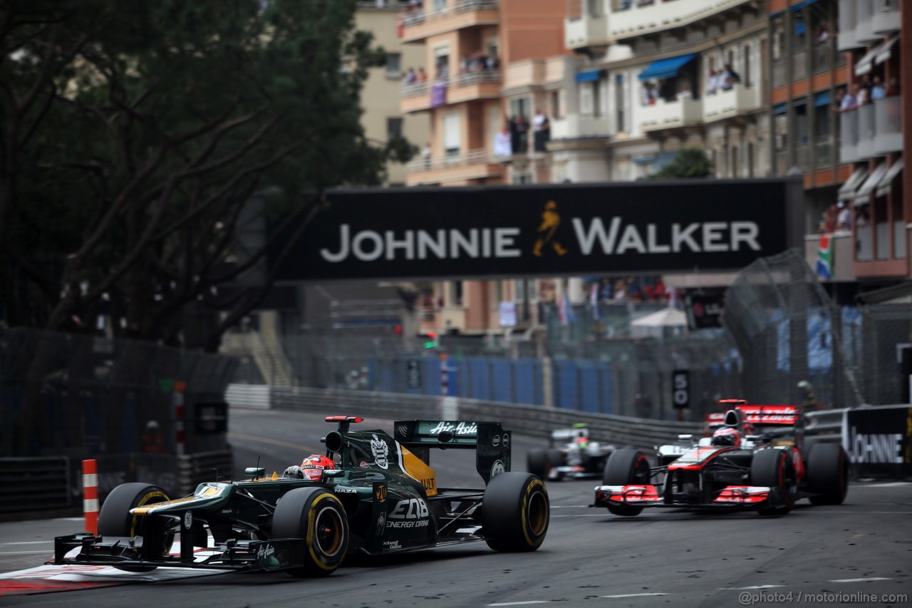 GP MONACO, 27.05.2012- Gara, Heikki Kovalainen (FIN) Caterham F1 Team CT01 e Jenson Button (GBR) McLaren Mercedes MP4-27 