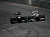 GP MONACO, 27.05.2012- Gara, Heikki Kovalainen (FIN) Caterham F1 Team CT01 e Sergio Prez (MEX) Sauber F1 Team C31