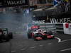 GP MONACO, 27.05.2012- Gara, Crash, Heikki Kovalainen (FIN) Caterham F1 Team CT01 e Jenson Button (GBR) McLaren Mercedes MP4-27 