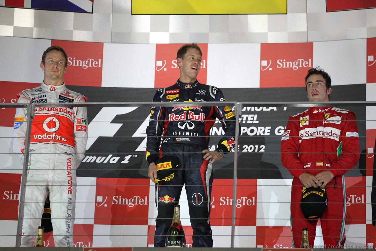 GP SINGAPORE, 23.09.2012 - Podium: winner Sebastian Vettel (GER) Red Bull Racing RB8, 2nd Jenson Button (GBR) McLaren Mercedes MP4-27, 3rd Fernando Alonso (ESP) Ferrari F2012