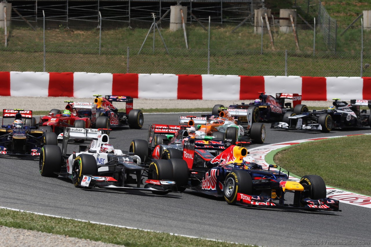 GP SPAGNA, 13.05.2012- Gara, Kamui Kobayashi (JAP) Sauber F1 Team C31 e Sebastian Vettel (GER) Red Bull Racing RB8 