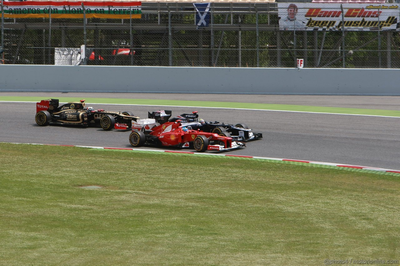 GP SPAGNA, 13.05.2012- Gara, Start of the race, Fernando Alonso (ESP) Ferrari F2012, Pastor Maldonado (VEN) Williams F1 Team FW34 e Kimi Raikkonen (FIN) Lotus F1 Team E20 