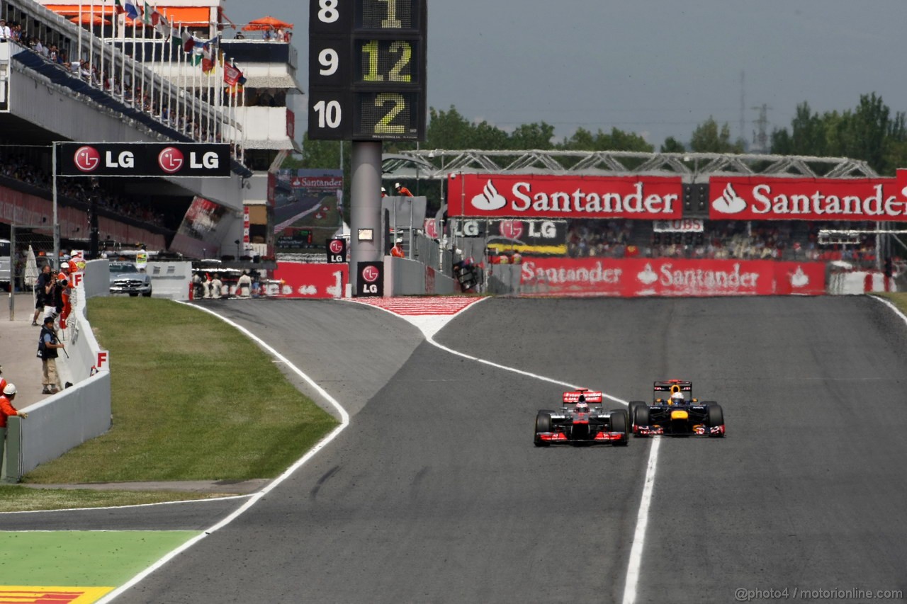 GP SPAGNA, 13.05.2012- Gara, Jenson Button (GBR) McLaren Mercedes MP4-27 e Sebastian Vettel (GER) Red Bull Racing RB8 