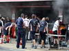 SPAIN GP, 13.05.2012- A fire in the Williams pit garage after the celebrations is tended to by members of all F1 teams