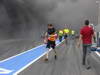 GP SPAGNA, 13.05.2012- A fire in the Williams pit garage after the celebrations is tended to by members of all F1 teams