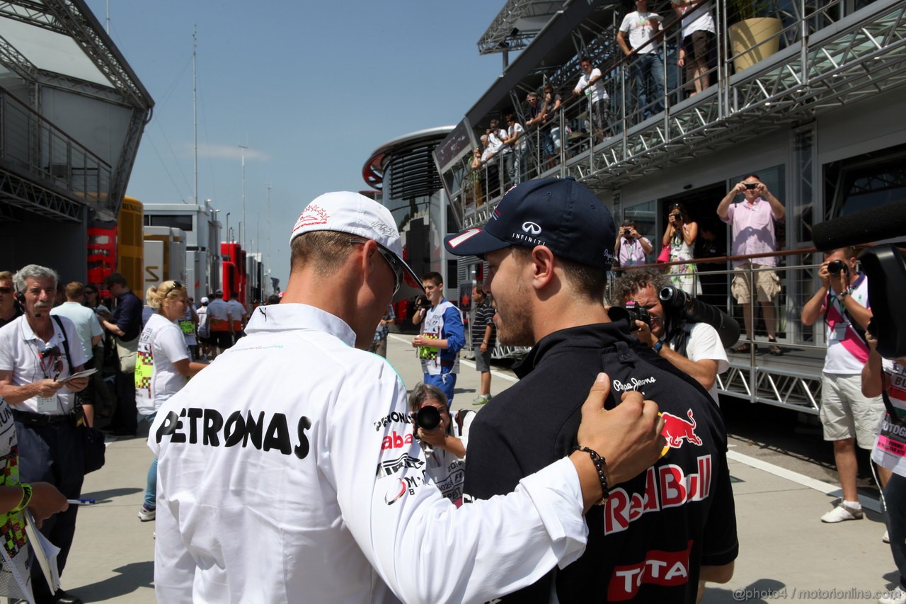 GP UNGHERIA, 29.07.2012- Michael Schumacher (GER) Mercedes AMG F1 W03 e Sebastian Vettel (GER) Red Bull Racing RB8 