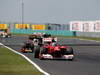 GP UNGHERIA, 29.07.2012- Gara, Fernando Alonso (ESP) Ferrari F2012 davanti a Kimi Raikkonen (FIN) Lotus F1 Team E20 