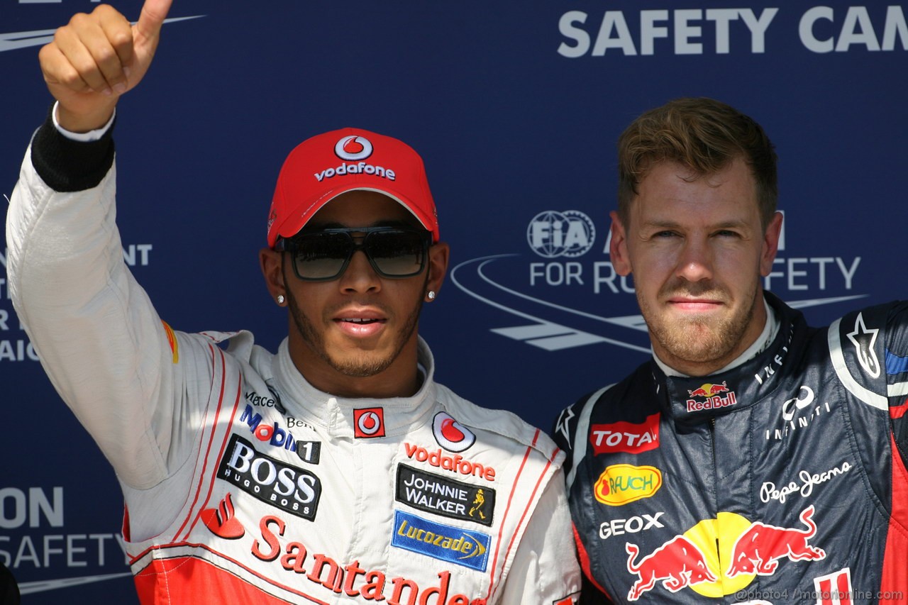 GP UNGHERIA, 28.07.2012- Qualifiche, Lewis Hamilton (GBR) McLaren Mercedes MP4-27 pole position e terzo Sebastian Vettel (GER) Red Bull Racing RB8 