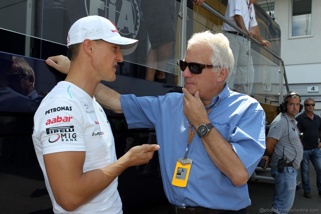 GP UNGHERIA, 28.07.2012- Michael Schumacher (GER) Mercedes AMG F1 W03 e Charlie Whiting (GBR), Gara director e safety delegate  