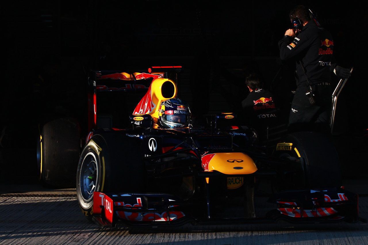Jerez Test Febbraio 2012, JEREZ DE LA FRONTERA, SPAIN - FEBRUARY 09:  Sebastian Vettel of Germany e Red Bull Racing exits his team garage to drive the new Red Bull Racing RB8 during day three of Formula One winter testing at the Circuito de Jerez on February 9, 2012 in Jerez de la Frontera, Spain.  (Photo by Mark Thompson/Getty Images)