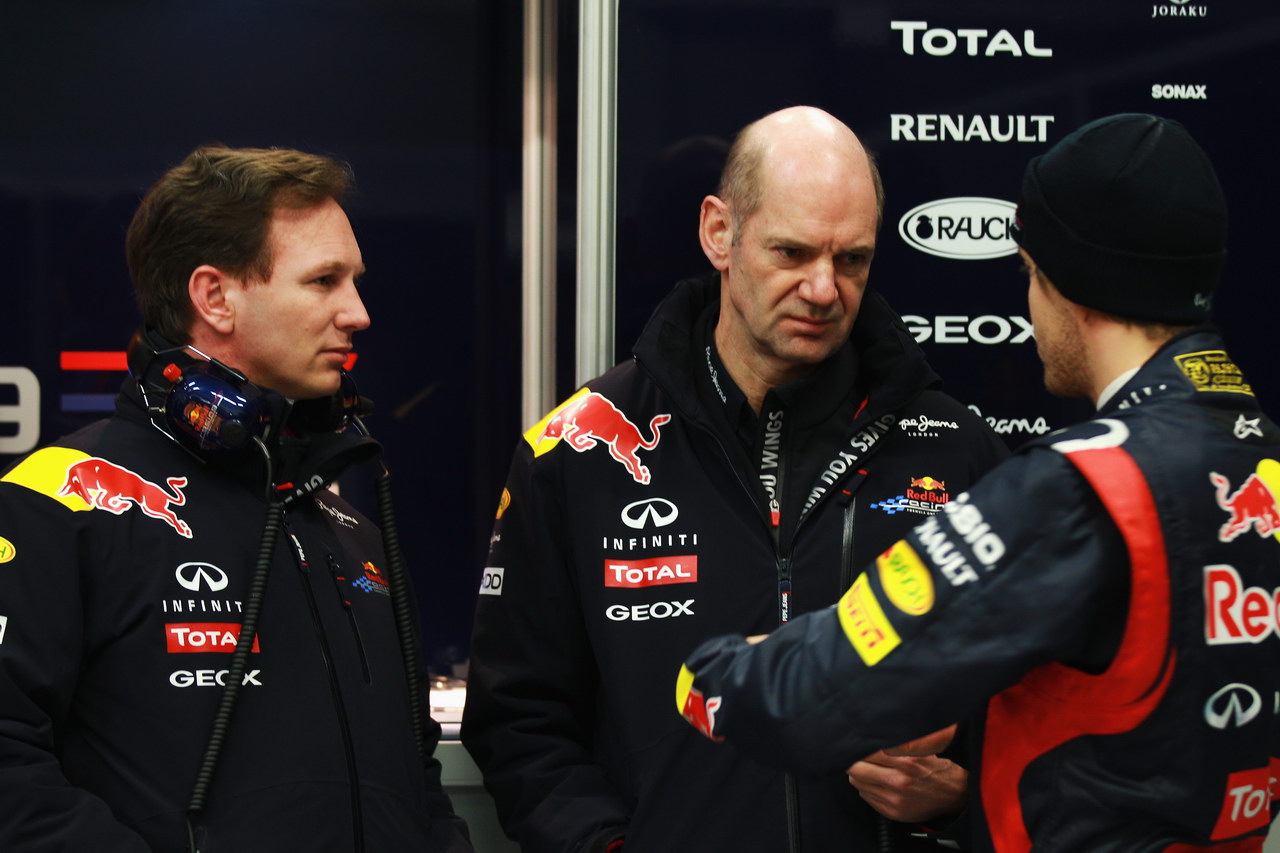 Jerez Test Febbraio 2012, JEREZ DE LA FRONTERA, SPAIN - FEBRUARY 09:  (L-R) Red Bull Racing Team Principal Christian Horner, Red Bull Racing Chief Technical Officer Adrian Newey e  Sebastian Vettel of Germany e Red Bull Racing talk in their team garage during day three of Formula One winter testing at the Circuito de Jerez on February 9, 2012 in Jerez de la Frontera, Spain.  (Photo by Mark Thompson/Getty Images)