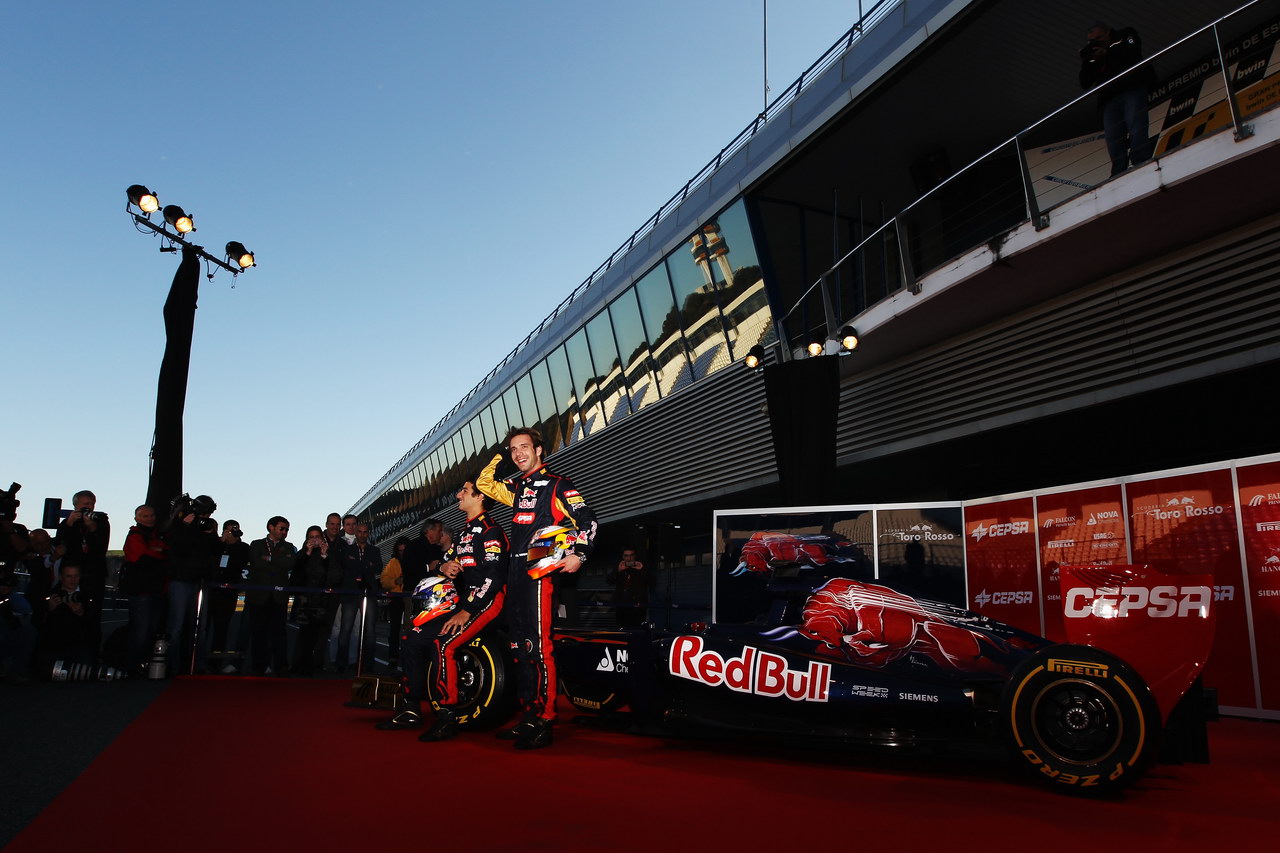 Toro Rosso STR7, JEREZ DE LA FRONTERA, SPAIN - FEBRUARY 06:  Scuderia Toro Rosso drivers Jean-Eric Vergne (R) of France e Daniel Ricciardo (L) of Australia attend the unveiling of the new Scuderia Toro Rosso STR7 at the Circuito de Jerez on February 6, 2012 in Jerez de la Frontera, Spain.  (Photo by Clive Mason/Getty Images)
