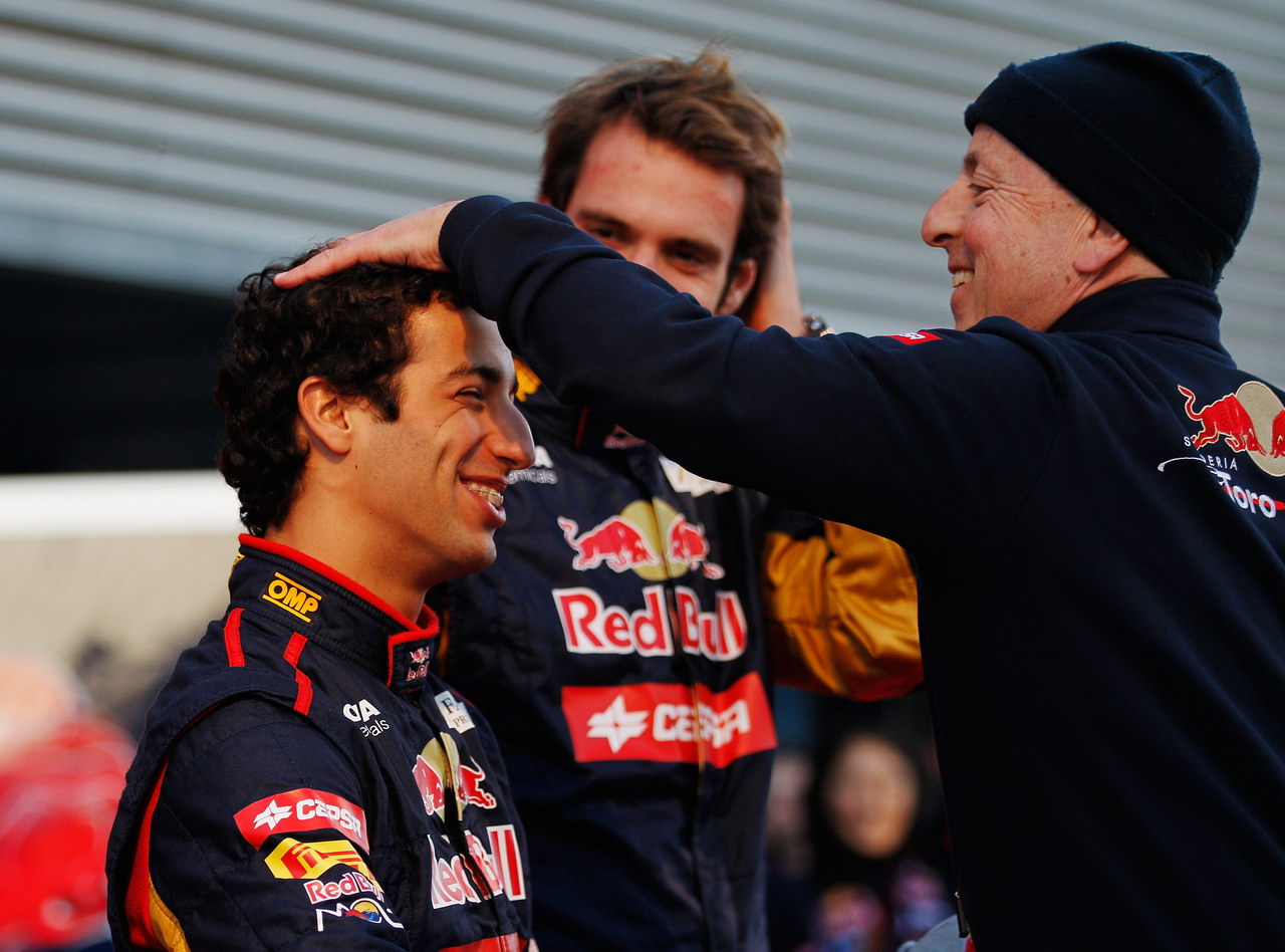 Toro Rosso STR7, JEREZ DE LA FRONTERA, SPAIN - FEBRUARY 06:  Scuderia Toro Rosso driver Daniel Ricciardo of Australia shares a joke with Eric Silbermann of Scuderia Toro Rosso while attending the unveiling of the new Scuderia Toro Rosso STR7 at the Circuito de Jerez on February 6, 2012 in Jerez de la Frontera, Spain.  (Photo by Paul Gilham/Getty Images)