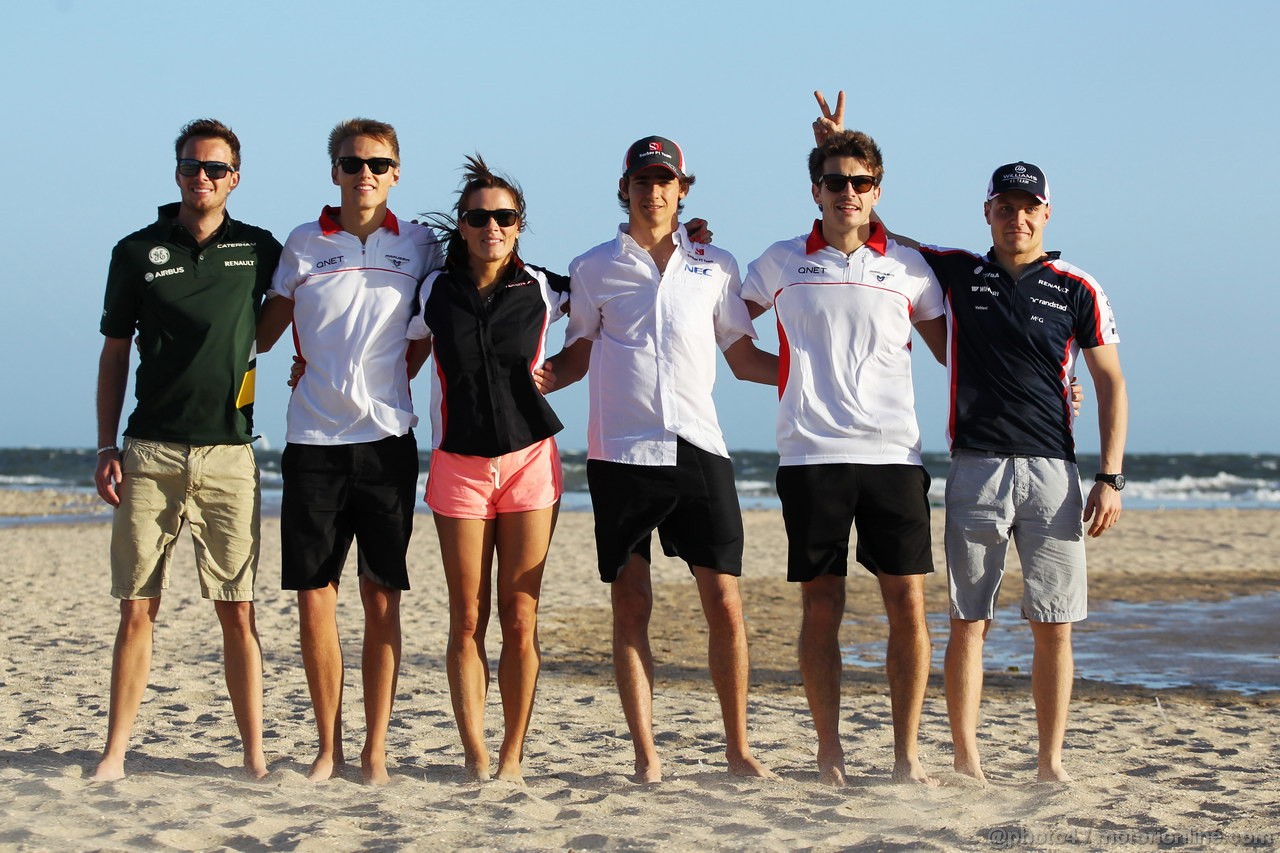GP AUSTRALIA, 13.03.2013- Rookie drivers on the beach (L to R): Giedo van der Garde (NLD) Caterham F1 Team; Max Chilton (GBR) Marussia F1 Team; Natalie Pinkham (GBR) Sky Sports Presenter; Esteban Gutierrez (MEX) Sauber; Jules Bianchi (FRA) Marussia F1 Team; Valtteri Bottas (FIN) Williams.

