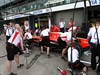 GP AUSTRALIA, 15.03.2013- Marussia's meccanici practice a pit stop