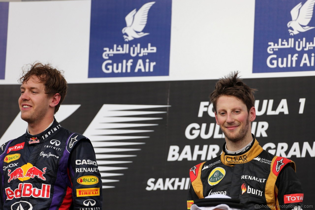 GP BAHRAIN, 21.04.2013- Gara, Sebastian Vettel (GER) Red Bull Racing RB9 vincitore e Romain Grosjean (FRA) Lotus F1 Team E21 terzo 