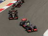 GP BAHRAIN, 21.04.2013- Gara, Sergio Perez (MEX) McLaren MP4-28 davanti a Kimi Raikkonen (FIN) Lotus F1 Team E21 