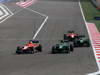 GP BAHRAIN, 21.04.2013- Gara, Jules Bianchi (FRA) Marussia F1 Team MR02 e Charles Pic (FRA) Caterham F1 Team CT03 