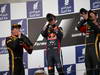 GP BAHRAIN, 21.04.2013- Gara, secondo Kimi Raikkonen (FIN) Lotus F1 Team E21, Sebastian Vettel (GER) Red Bull Racing RB9 vincitore e terzo Romain Grosjean (FRA) Lotus F1 Team E21 