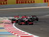 GP BAHRAIN, 21.04.2013- Gara, Jenson Button (GBR) McLaren Mercedes MP4-28 davanti a Sergio Perez (MEX) McLaren MP4-28 