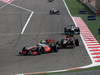 GP BAHRAIN, 21.04.2013- Race, Sergio Perez (MEX) McLaren MP4-28 ahead of Kimi Raikkonen (FIN) Lotus F1 Team E21