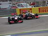 GP BAHRAIN, 21.04.2013- Gara, Jenson Button (GBR) McLaren Mercedes MP4-28 e Sergio Perez (MEX) McLaren MP4-28 