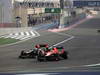 GP BAHRAIN, 21.04.2013- Gara, Romain Grosjean (FRA) Lotus F1 Team E21 e Jules Bianchi (FRA) Marussia F1 Team MR02 